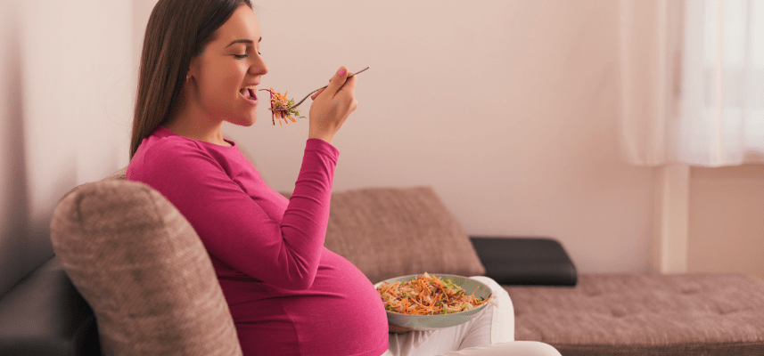pregnant woman eating food